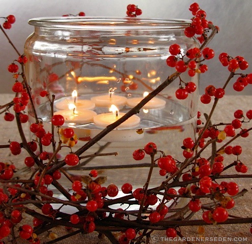 Bittersweet and floating votive candles 